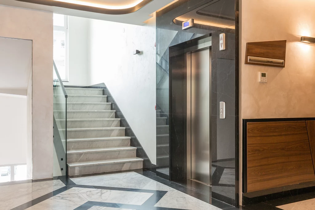 Modern lift in a building hall